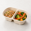 Bagasse container with chicken, rice and vegetables
