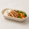 Bagasse container filled with rice, chicken and vegetables