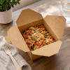 1080ml kraft takeaway food box filled with chicken salad and vegetables