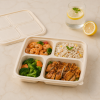 Prepared meal displayed in 1100ml four compartment cornstarch takeaway food container