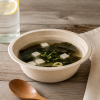 500ml bagasse bowl serving seaweed tofu soup on wooden table